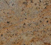 Tan and brown granite surface with dark speckles.