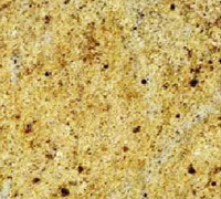 Yellow granite with dark brown flecks.