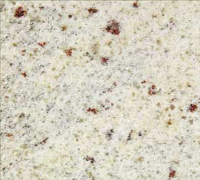 White granite countertop with red and gray specks.