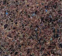 Brown granite countertop with dark and teal flecks.