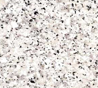 White granite with small black flecks.