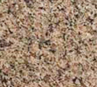 Tan and reddish granite stone with flecks of black and brown.