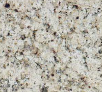 Granite countertop with a speckled pattern of beige, brown, and black.