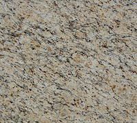 Tan and black speckled granite surface.