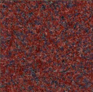 Red granite stone with dark flecks.