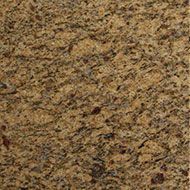 Golden granite with dark brown and black veins.