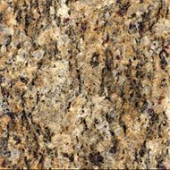Granite surface with a speckled pattern of beige, brown, and black.