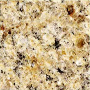 Tan granite countertop with black and brown speckles.