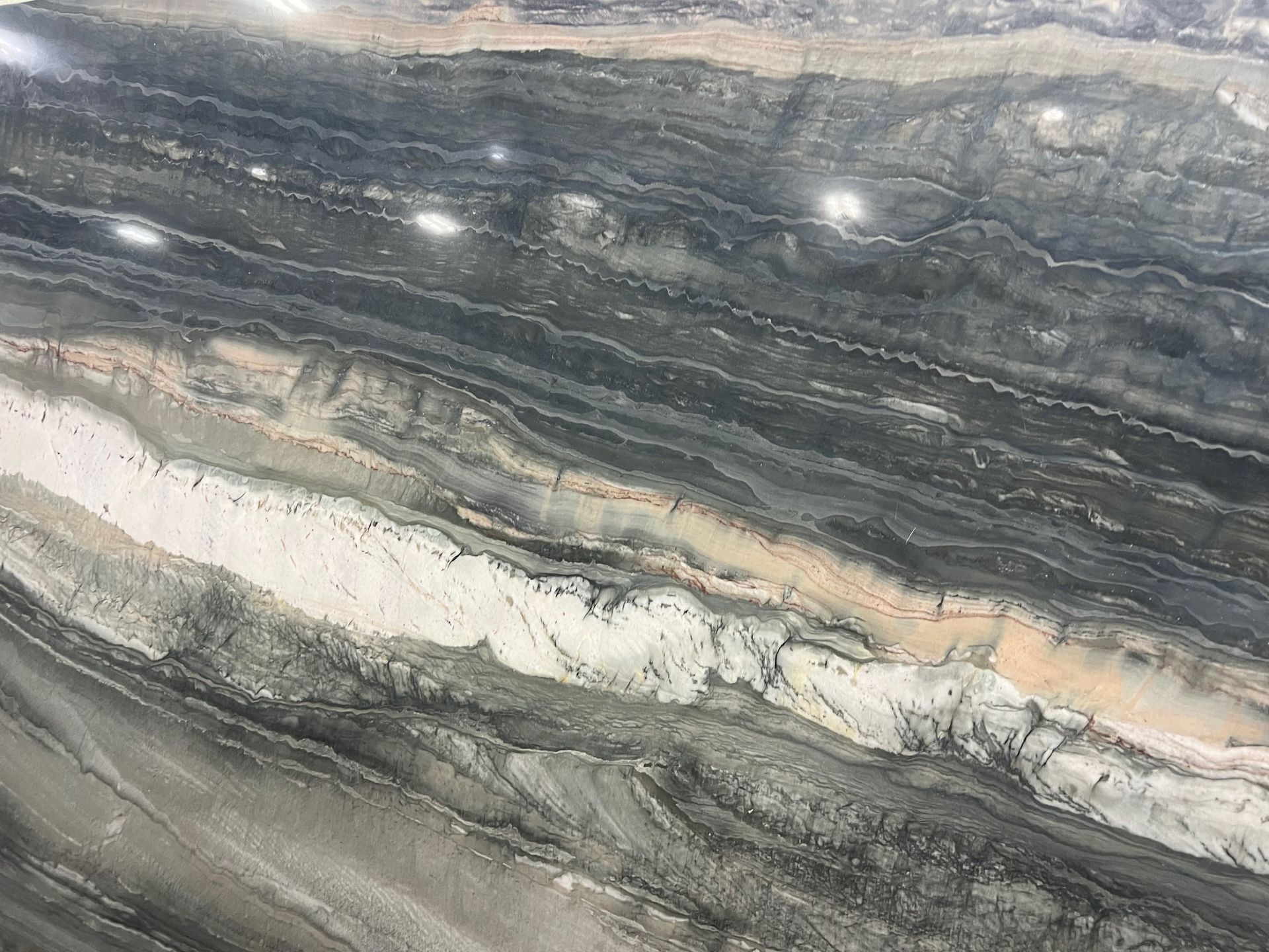 A close up of a granite counter top with a marble texture
