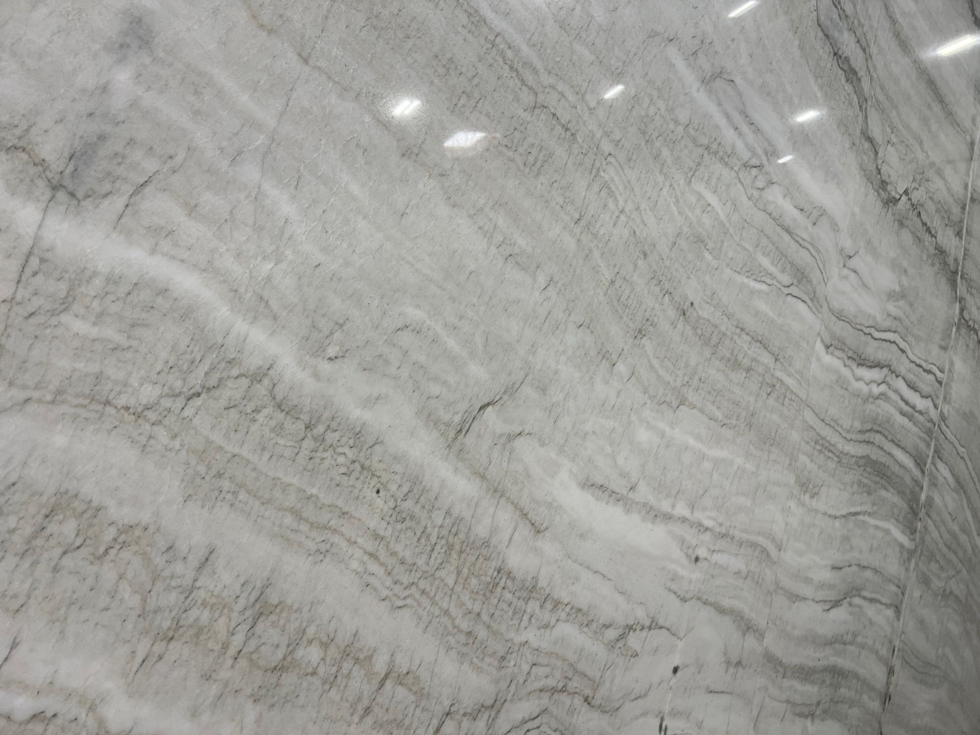 Gray and white marble with wavy veining.