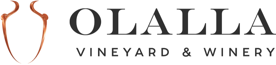 The logo for olalla vineyard and winery is shown