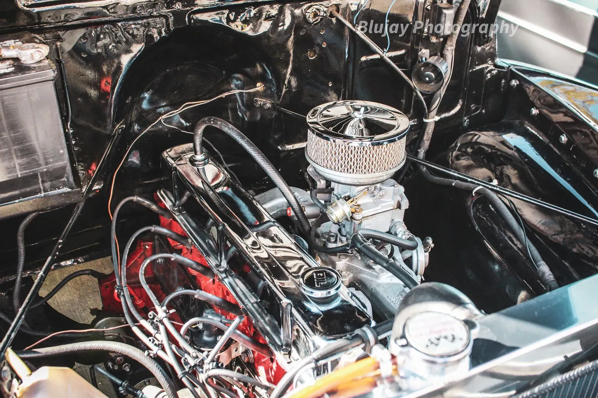 A close up of a car engine by newjay photography
