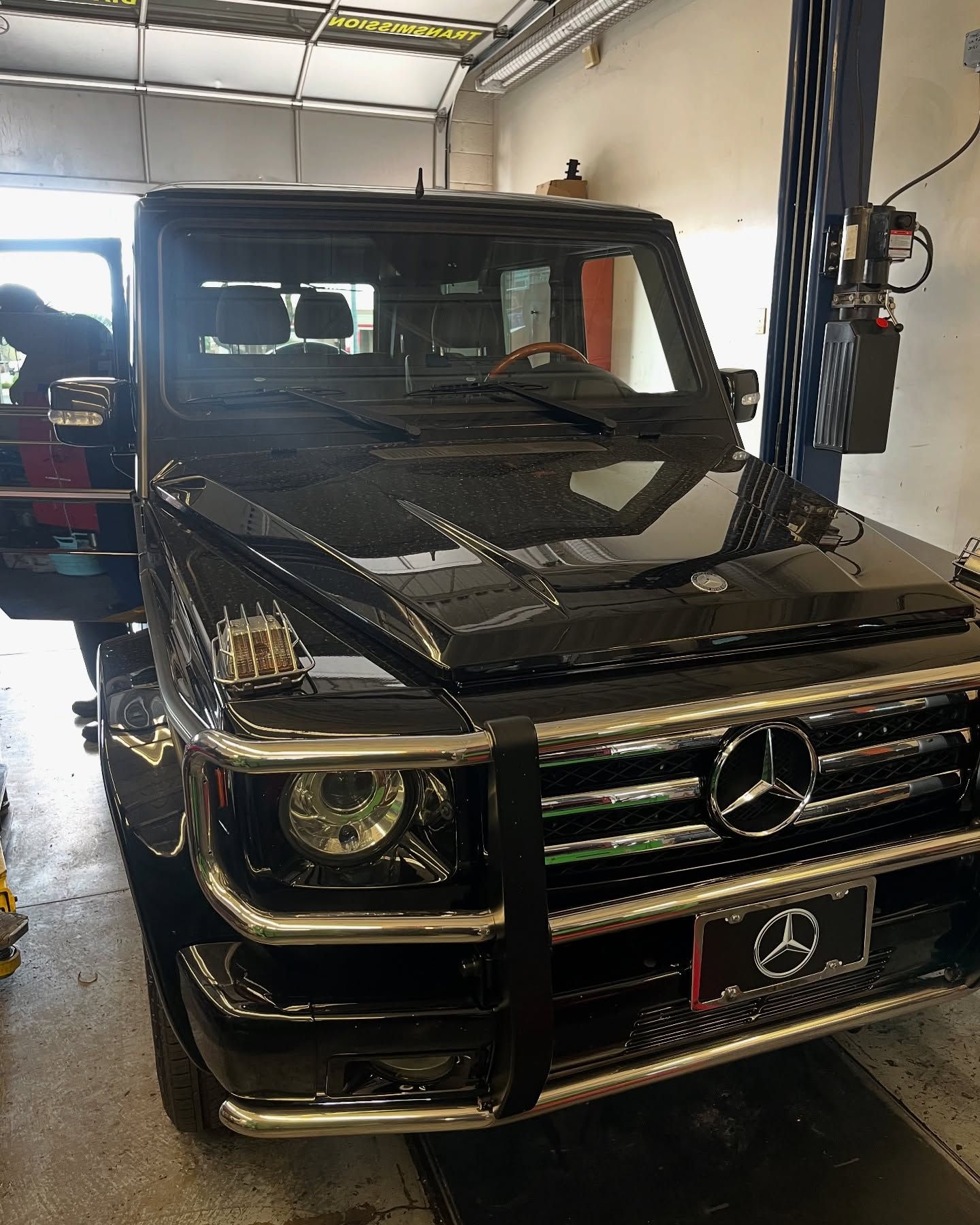 Mercedes in repair at shop | New Dimensions Automotive