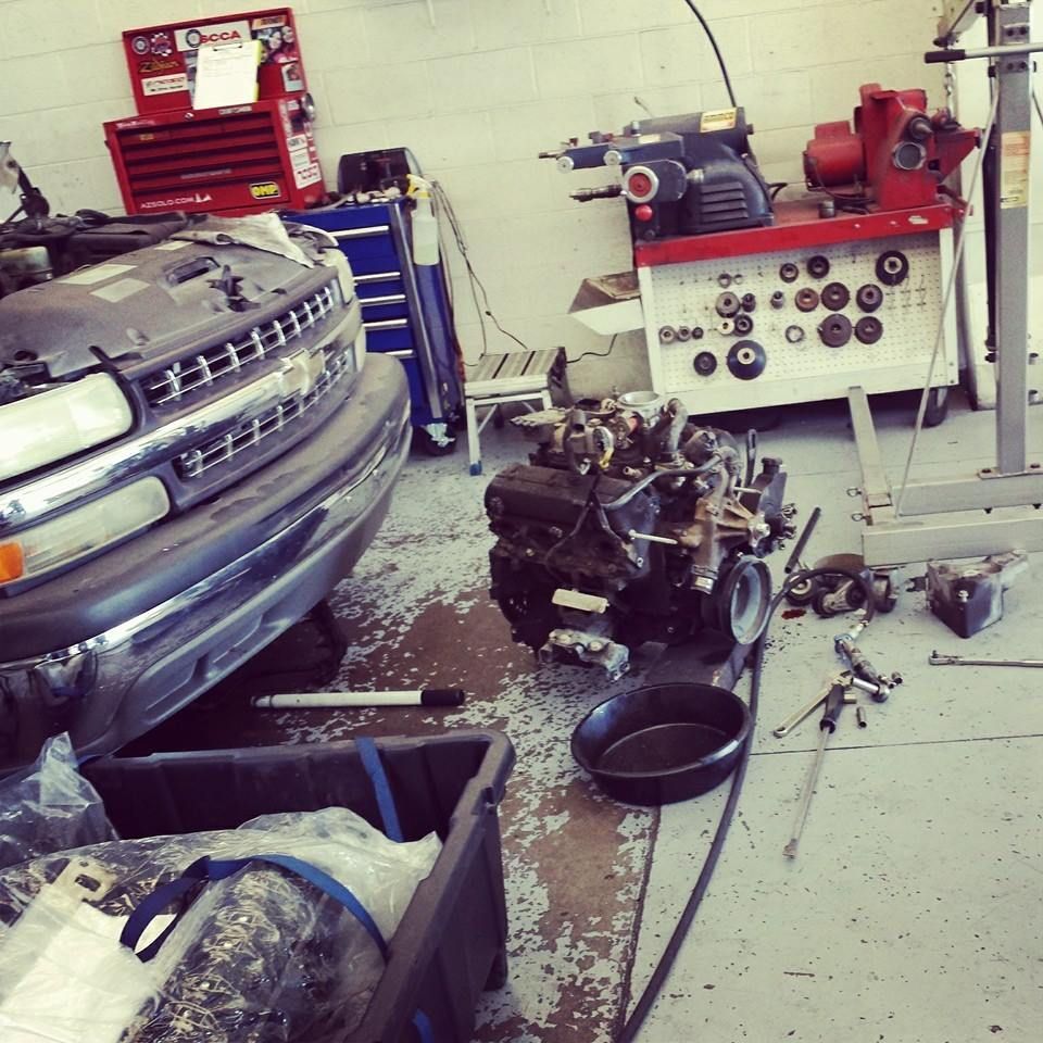 Engine Repair Work In Progress Inside Shop Bay | New Dimensions Automotive