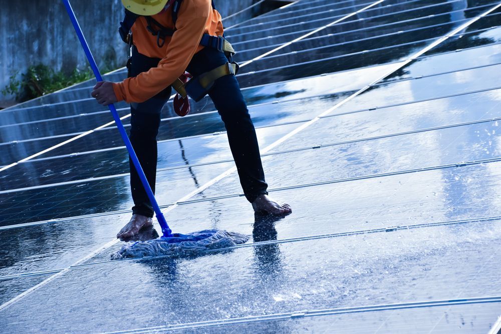 clean the solar panels that are dirty with dust and birds' droppings to improve the efficiency of solar energy
