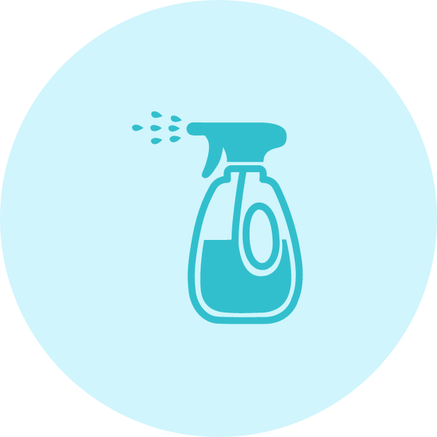 Blue spray bottle dispensing liquid.