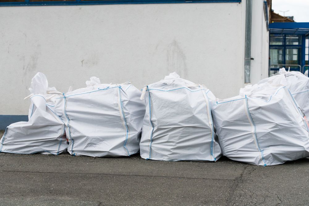 White Bags Filled With Materials Are Tied Closed — Select Site Solutions in South Nowra, NSW