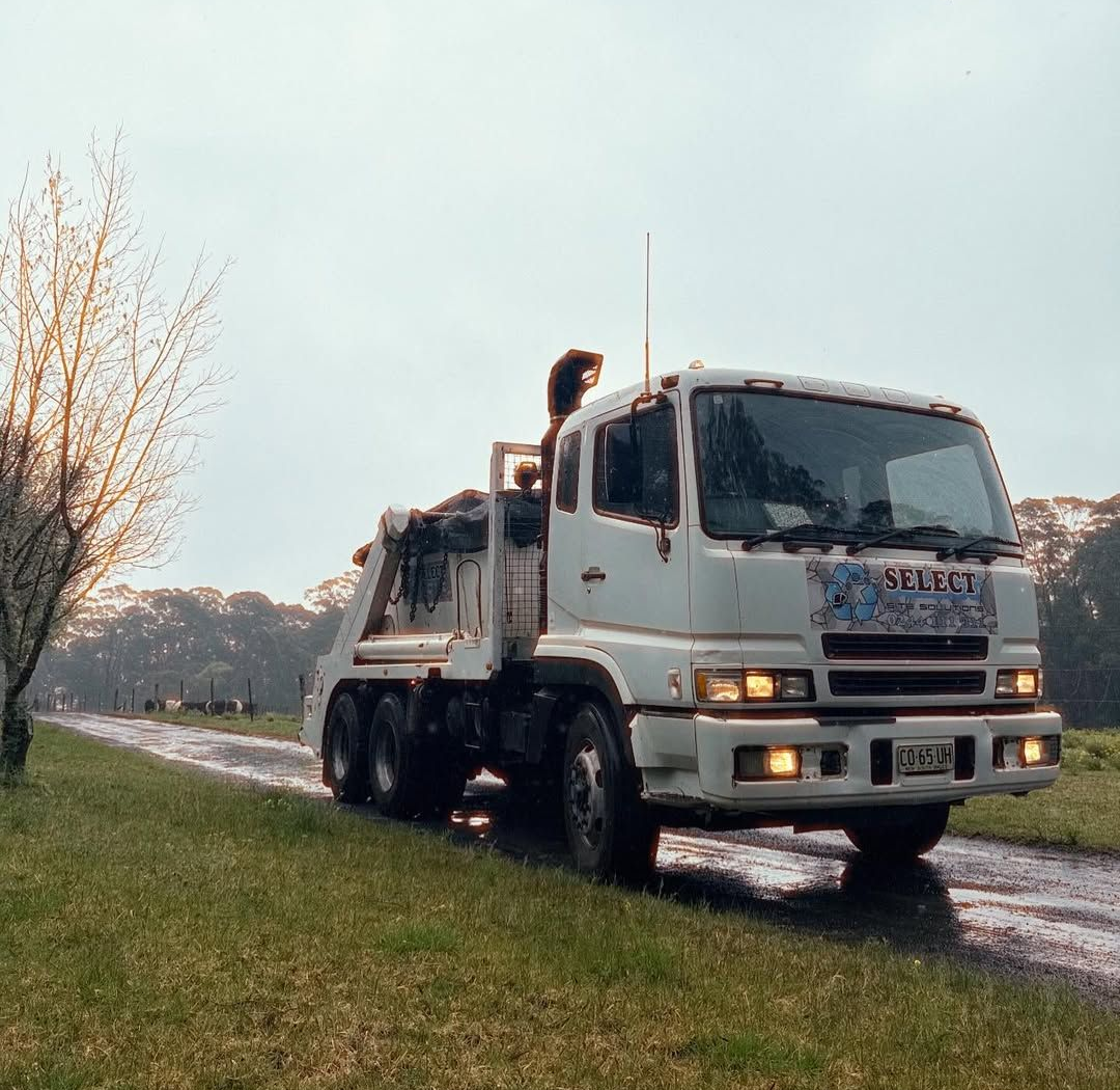 White Work Truck Driving on a Muddy Road — Select Site Solutions in South Nowra, NSW