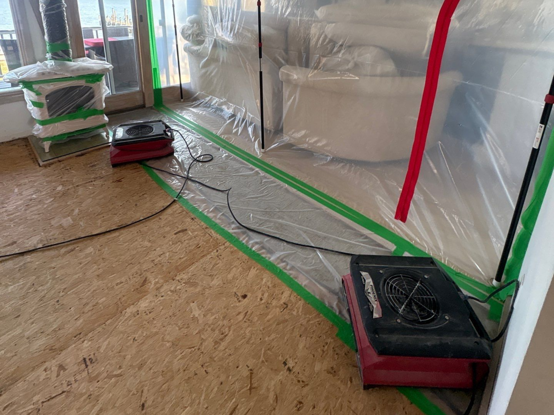 Containment areas setup at a home with water damage in Mastic Beach NY