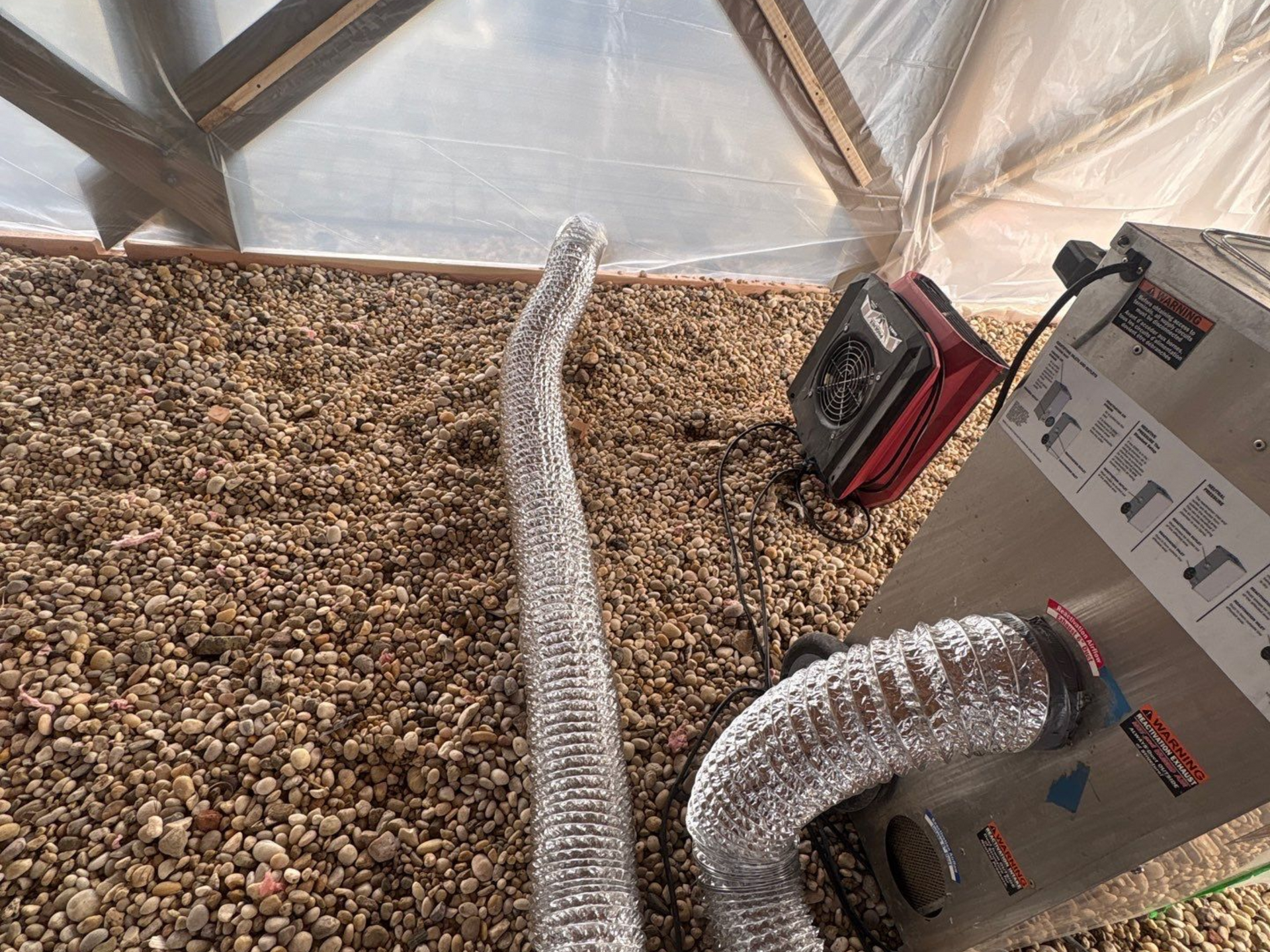 Structural drying heater with ventilation at a home in Mastic Beach, NY