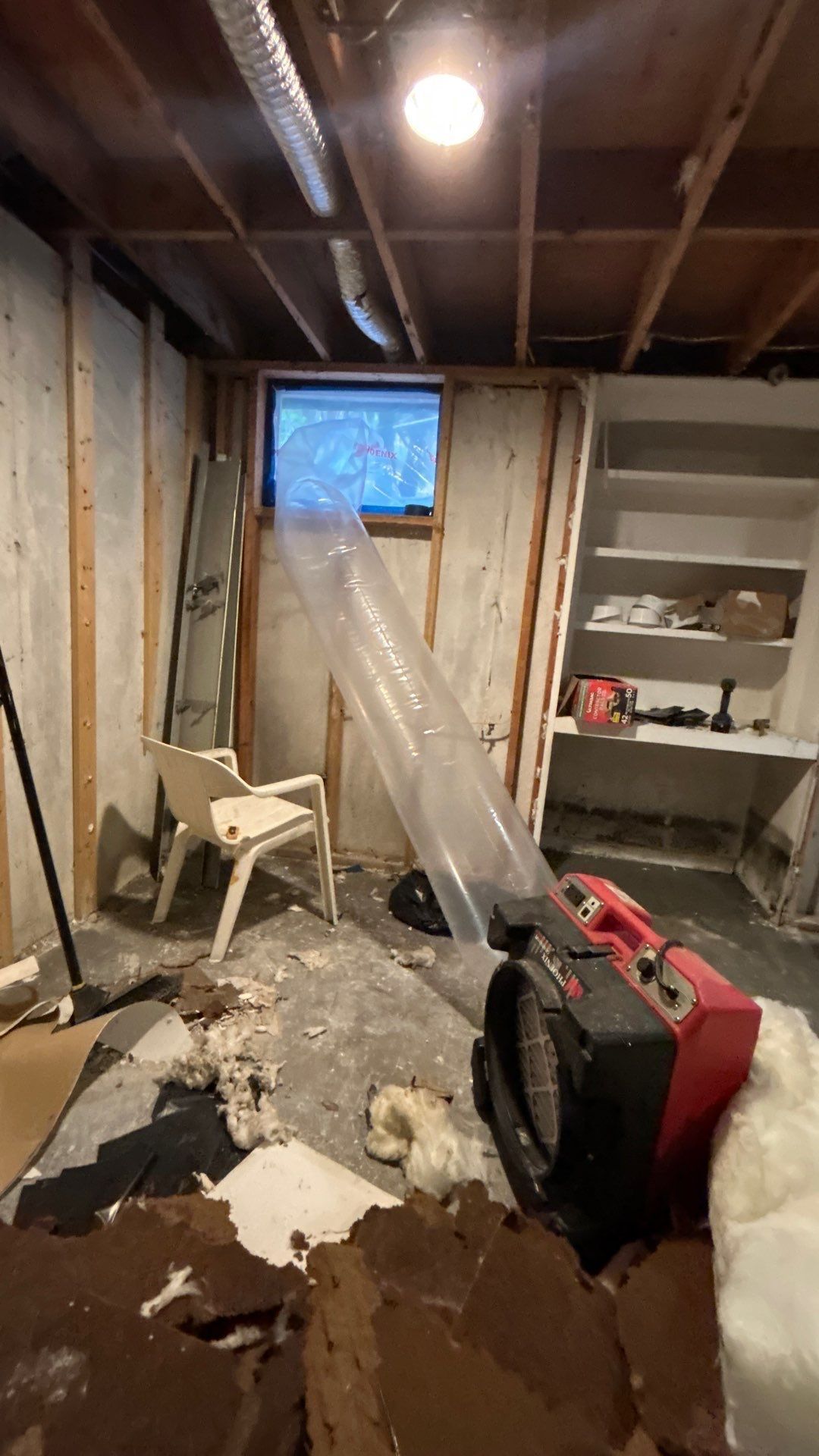 Air scrubber during mold remediation of flooded basement in Hampton Bays New York