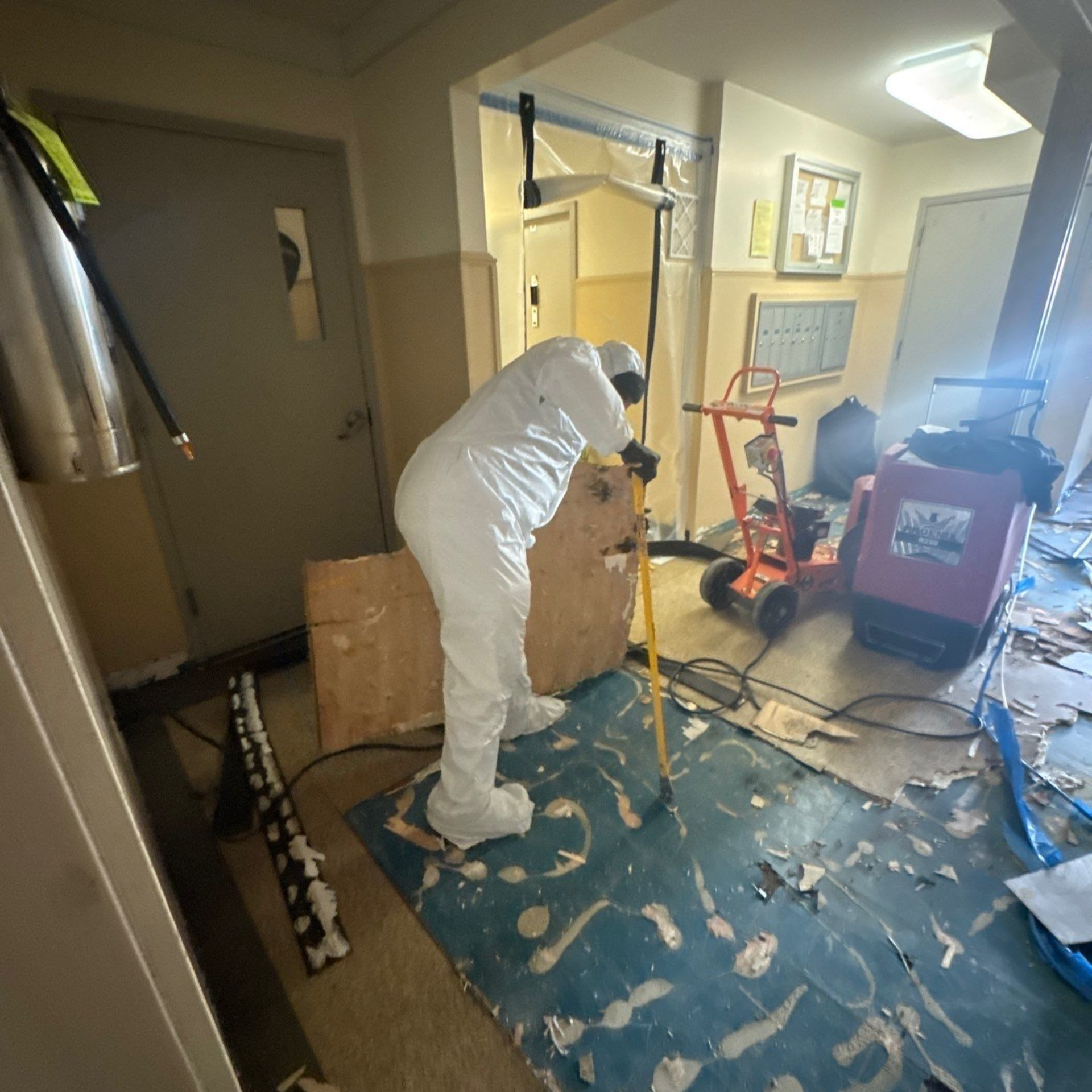 Removing damaged flooring after flooding in Huntington Station, NY
