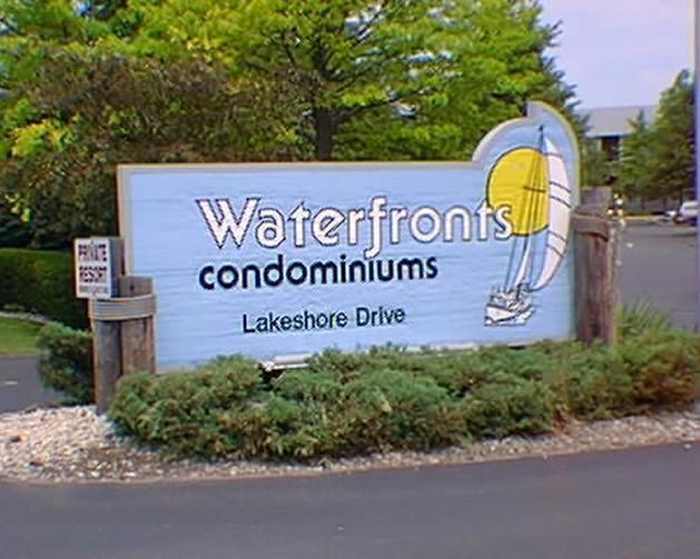 A sign for waterfront condominiums lakeshore drive