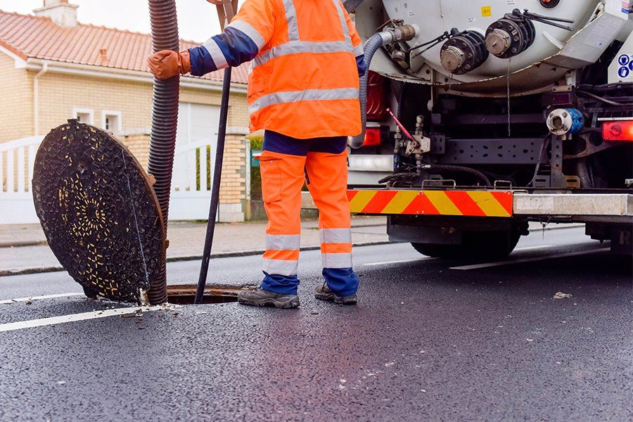 Cleaning and Maintaining the Sewer on the Road — Philadelphia, PA — In-A-Flash Plumbing & Heating