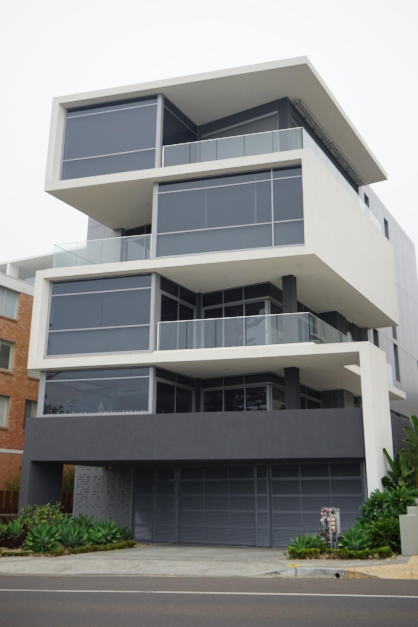 A Large Building With A Lot Of Windows And Balconies — Rendering By Yilmaz P/L In Wollongong, NSW