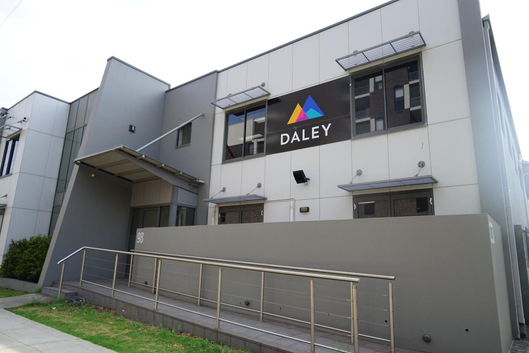 A Large Building With A Handicap Ramp And A Sign That Says Daley On It — Rendering By Yilmaz P/L In Kiama, NSW