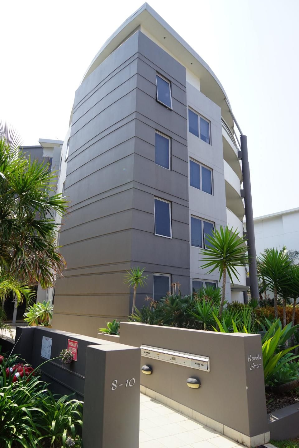 A Very Tall Building With A Lot Of Windows — Rendering By Yilmaz P/L In Kiama, NSW