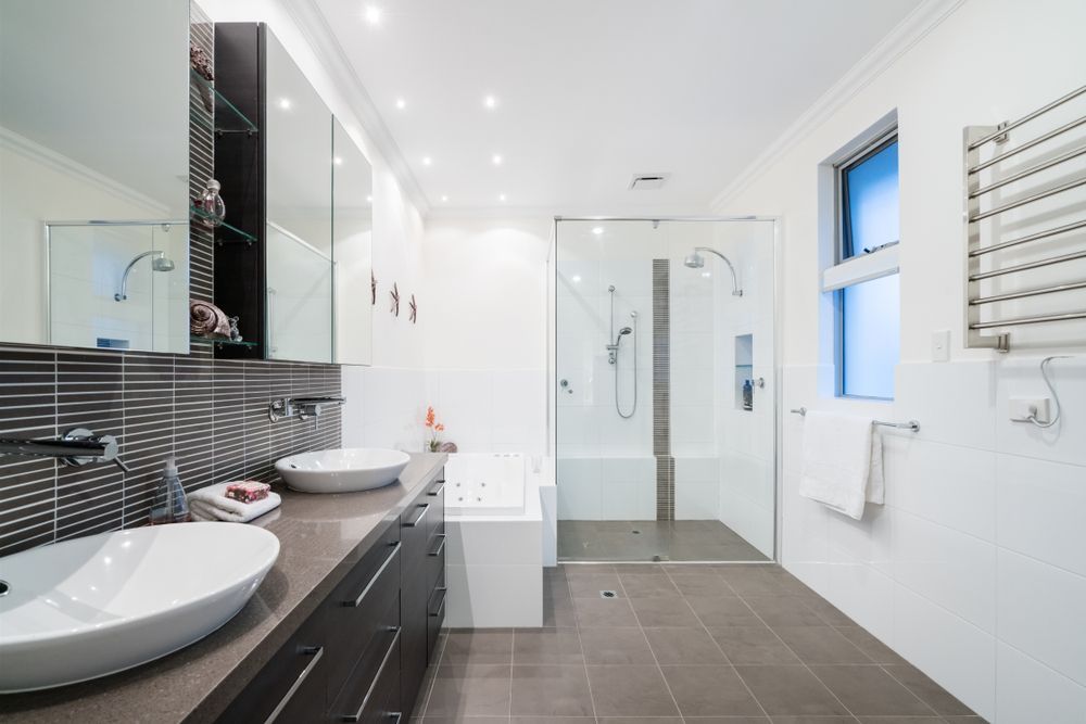 A Bathroom With Two Sinks and a Walk in Shower — Suncoast Kitchens In Kunda Park, QLD