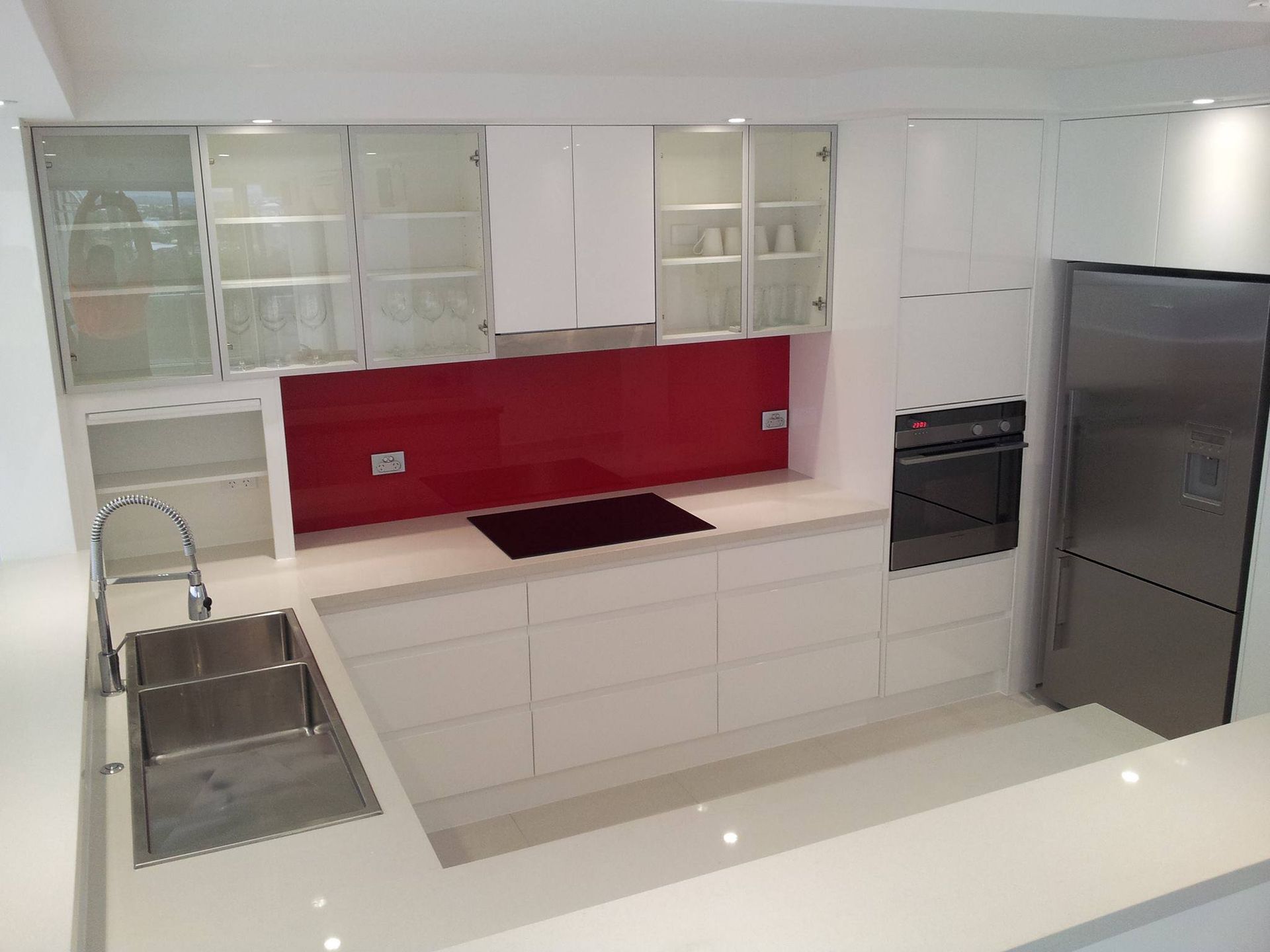 A Kitchen With White Cabinets and Stainless Steel Appliances — Suncoast Kitchens In Gympie, QLD