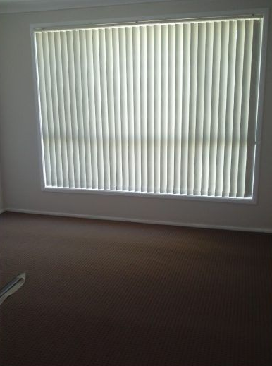 Large Window Covered by Vertical Blinds — Abundance Blinds In Wyong, NSW