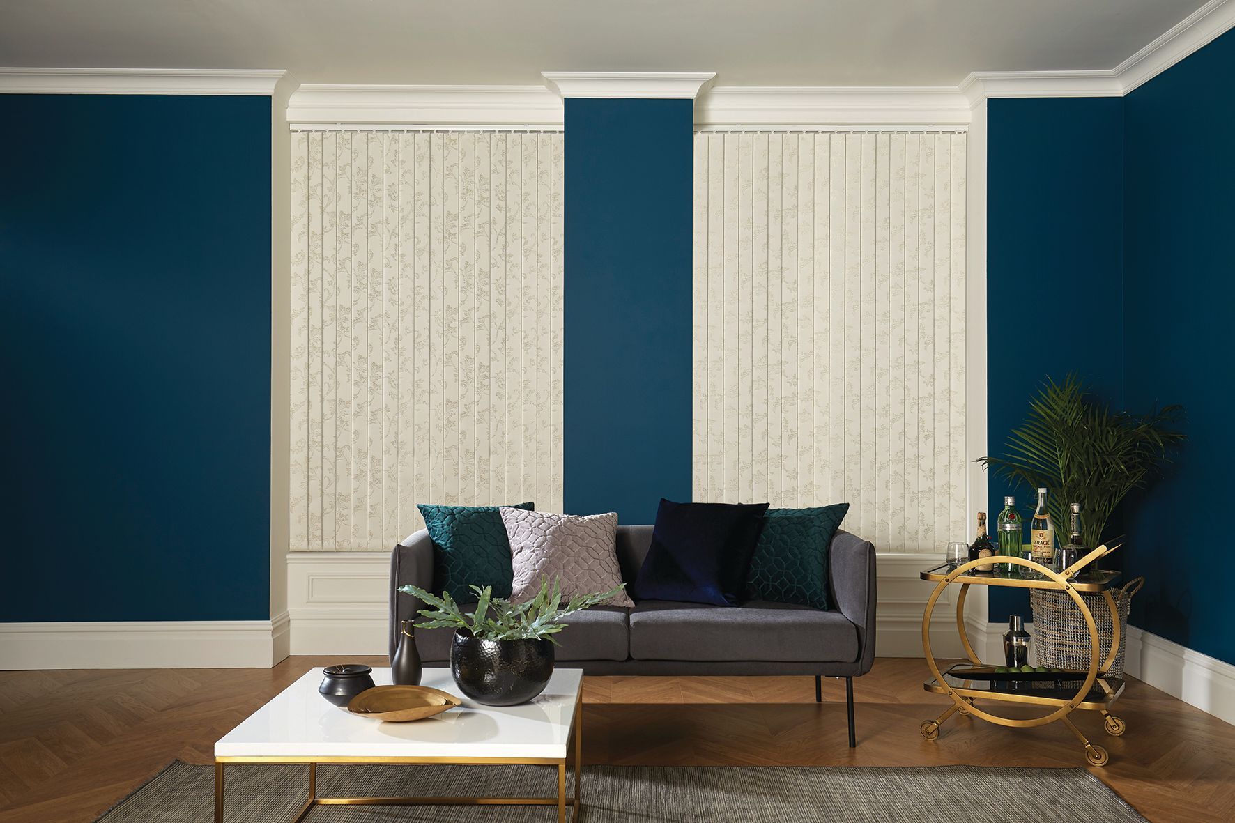 Living room with blue walls, beige blinds, a gray sofa, and a marble coffee table.  Abundance Blinds In Charmhaven, NSW