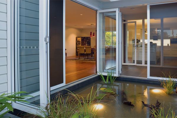A Pond With Plants — Abundance Blinds In Charmhaven, NSW