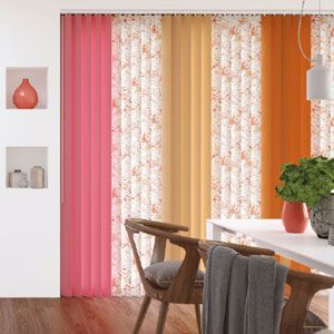 Patterned Vertical Blinds Behind a Dining Table and Chairs — Abundance Blinds In Charmhaven, NSW