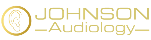 A logo for johnson audiology with a gold circle