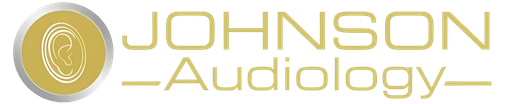 A logo for johnson audiology with a gold circle