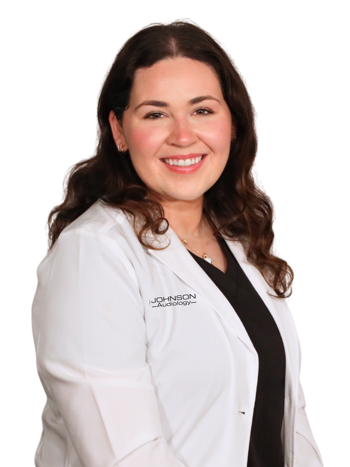 A woman in a white lab coat, smiling, with the name 