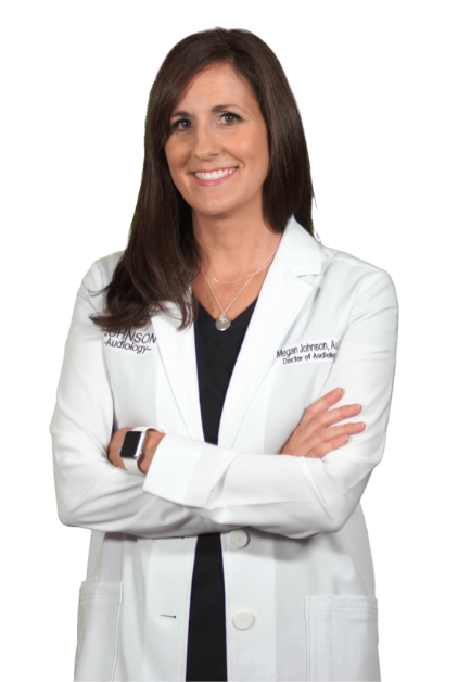 A woman in a white lab coat with her arms crossed