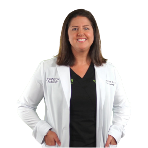 A woman wearing a lab coat with the name johnson on it