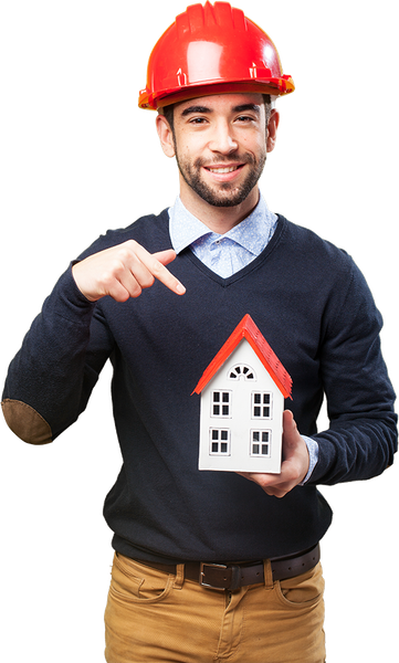 Man in hard hat points at a model house he holds.