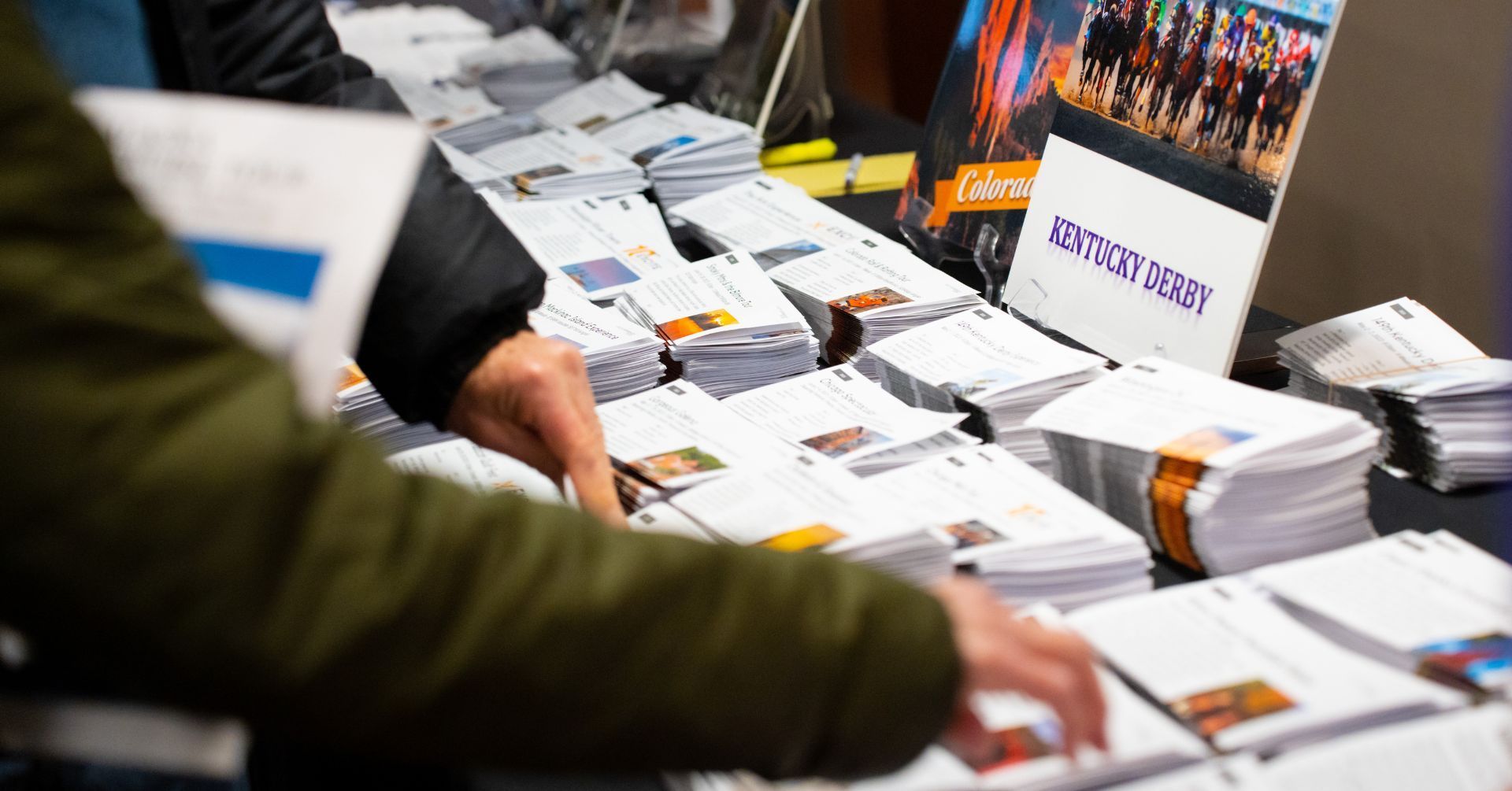 People looking at brochures
