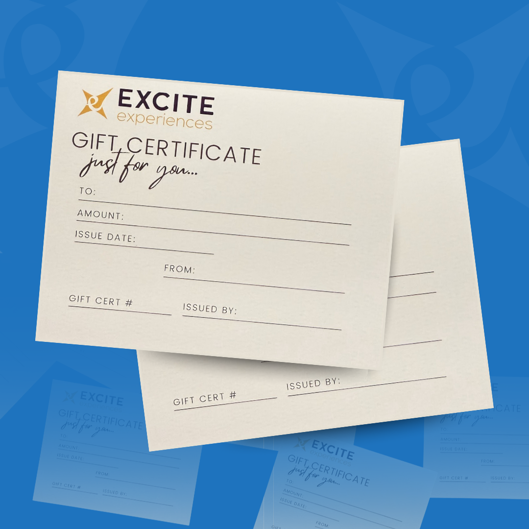 People waving from a hot air balloon basket; on a field, others watch. Red and white balloon above.