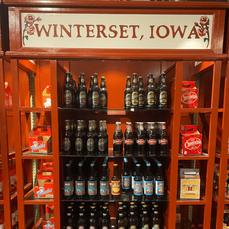Shelves of beer bottles and boxes in Winterset, Iowa store.