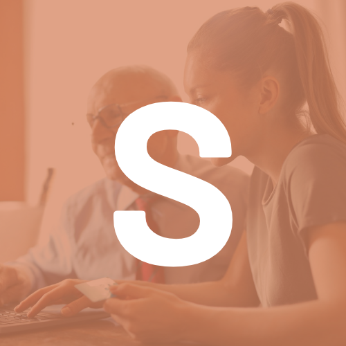 A man and a woman are looking at a laptop with the letter s in the corner.