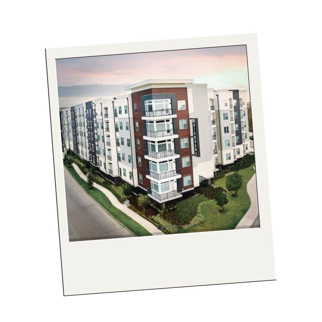 An aerial view of a large apartment building on a white background.