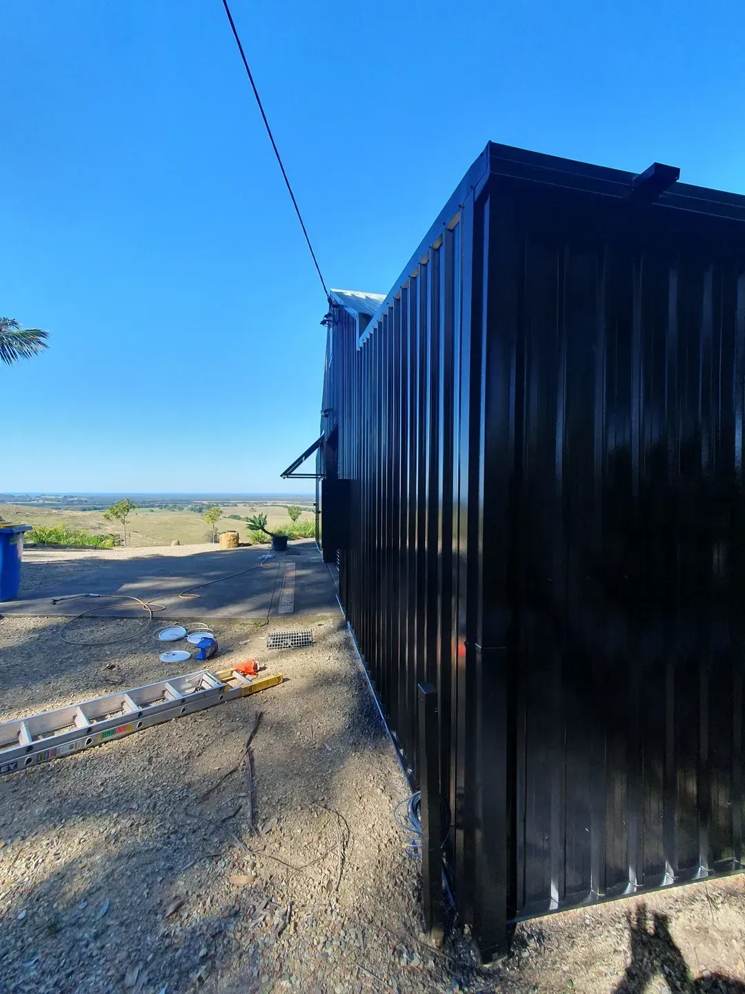 A Close Up of a Metal Wall — Magic Wand Roof Restoration & Painting in Mermaid Beach, QLD