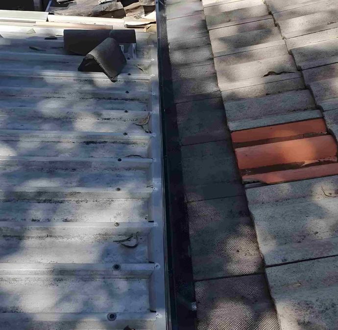 A Roof With a Brick — Magic Wand Roof Restoration & Painting in Mermaid Beach, QLD